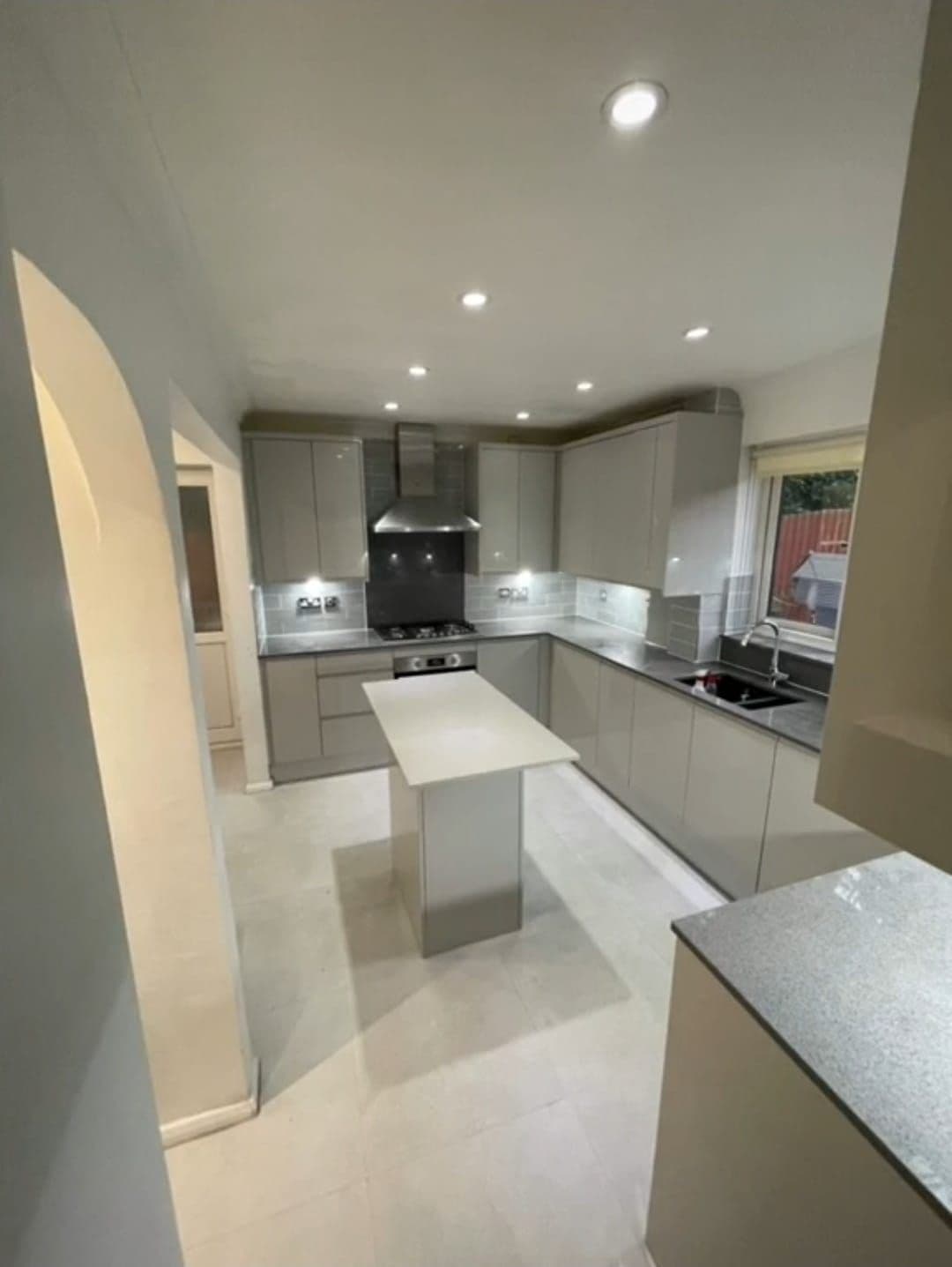Bright open-plan extension with glazed doors