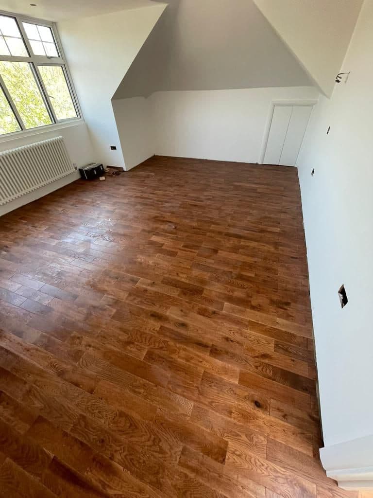 Finished living space with dark wood feature